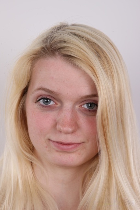 Blonde girl Jaroslava stands fully clothed before going bare naked on a stool 35248760