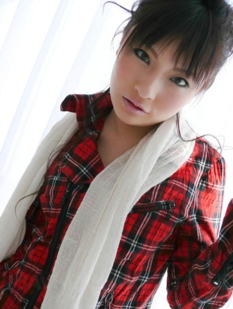 Japanese girl Rika Sonohara has sex with a couple of boys at the same time 16088653