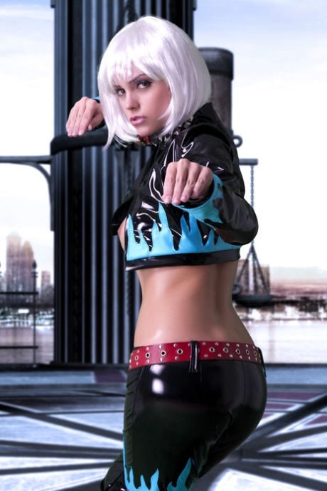 Platinum blonde cosplayer frees her firm breasts from latex clothing 58614009