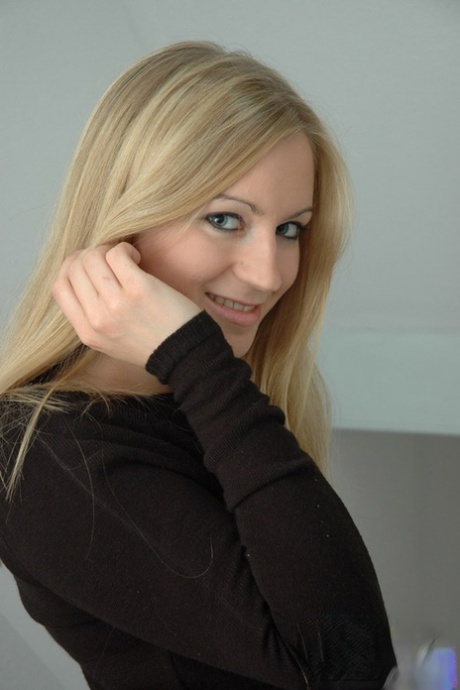 Blonde amateur Kiss Kristin covers up her naked boobs in thong underwear 32135547