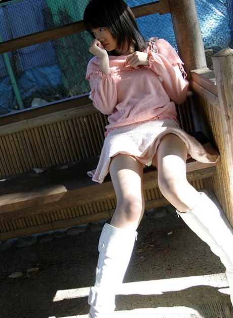 Japanese model Nana exposes her tits and bush in white latex boots 79641706