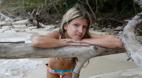 Solo girl Gina Gerson releases her tits from a bikini while at the beach 39193086