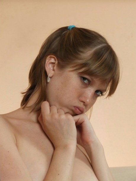 Cute teen Anabell exposes her great tits after playing with a stuffed animal 59395735