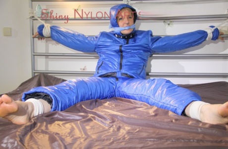 Caucasian woman is left gagged and tied to a bed in downwear 12839191