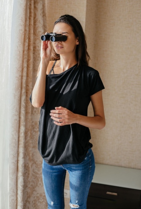 Slim teen Cristin masturbates while spying on her neighbors with binoculars 11456295
