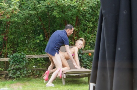 Inked blond Carmel Anderson takes a cumshot on her ass after sex on lawn chair 87096522