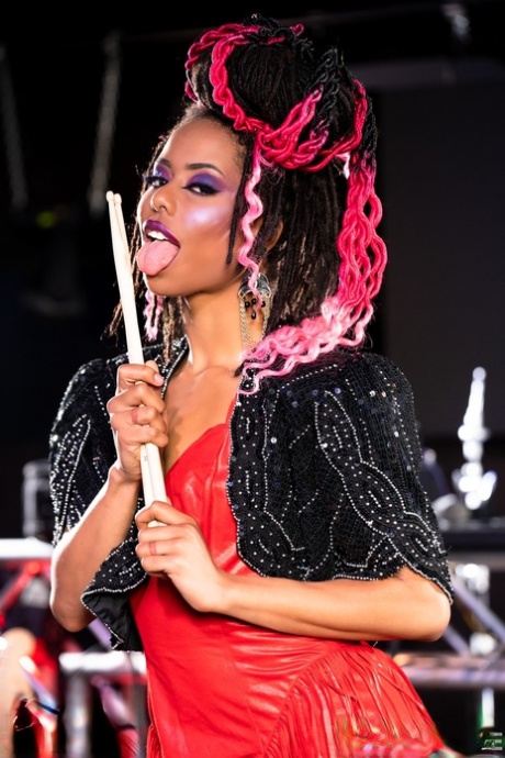 Female rockers show their upskirt underwear while performing on stage 37204686