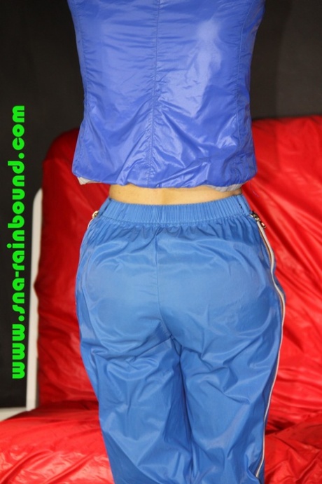 White girl is restrained with her hands above her head in nylon clothing 55811519