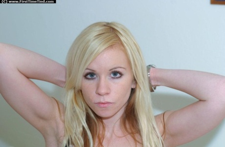 Blonde amateur peels off jeans prior to being gagged and hogtied 74099857