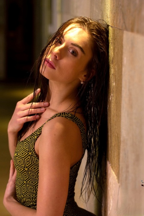 Skinny beauty Sabrisse takes off her swimsuit to pose nude by an indoor pool 99873404