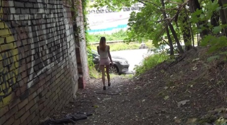 Skinny girl Adele Unicorn takes a badly needed piss on a path in the woods 50221347
