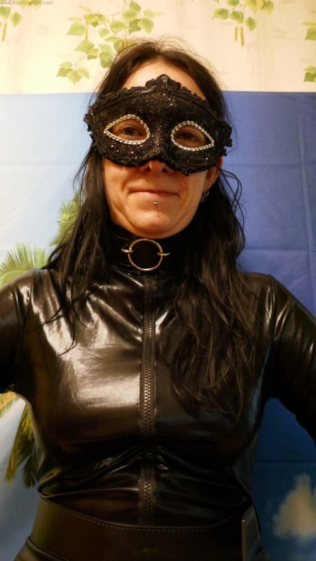 Amateur model works clear of cuffs in leather clothing and a mask 42853323