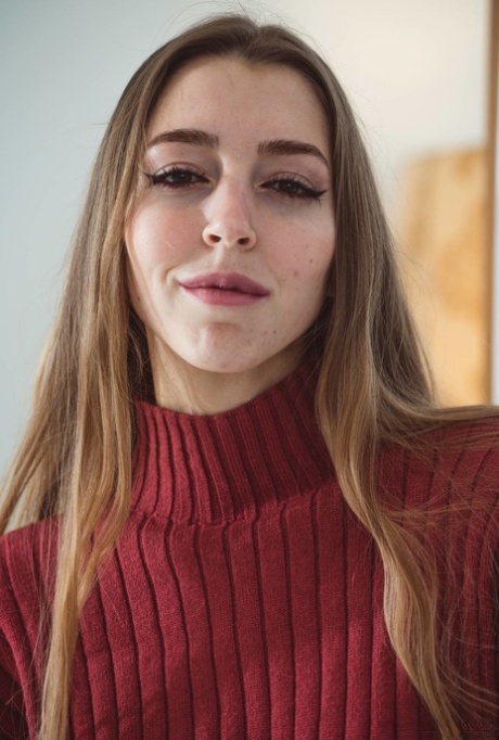 Hot teen Mary Popiense takes off her pants and underwear in a sweater 93976411