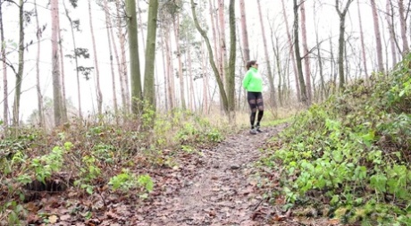 White girl Barbara Bieber gets caught taking a piss on a path in the woods 20150380