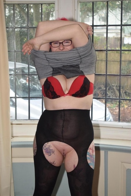 Overweight redhead gets naked while wearing glasses and crotchless pantyhose 36376540