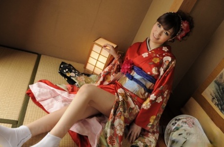 Pretty Japanese girl Yuria Tominaga shows her bush while wearing a kimono 49490358