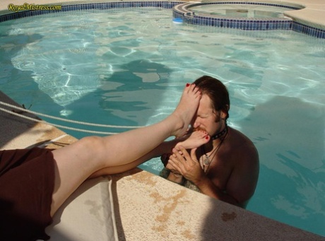 Puffy girl in glasses enjoys delicious foot fetish in the pool 38378660