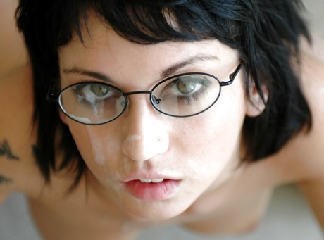 Cute coed in glasses Riley Evans gets her shaved pussy stretched 49449634
