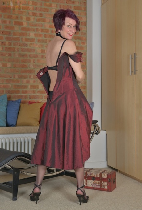 Mature nylon model Penny Brooks striking naughty girly mag poses 68594032