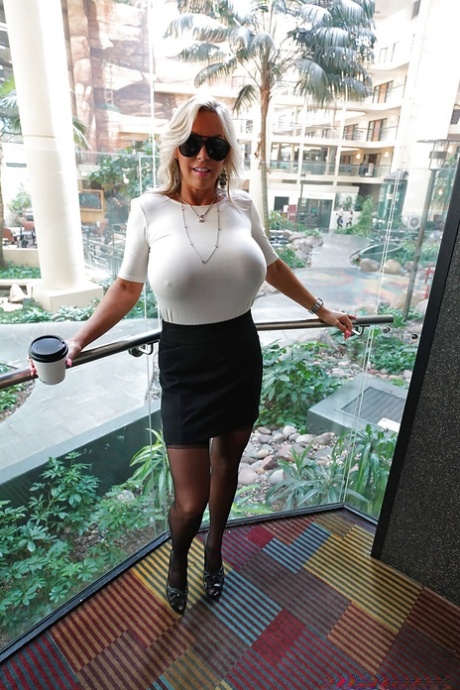 Older blonde housewife Sandra Otterson freeing massive babe type boobs 36744021