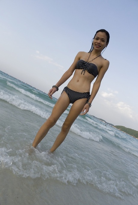 Horny big tit Asian shemale Wicky taking a trip to the beach 81425954